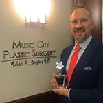 Michael Burgdorf with Award