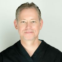 Dr. J. Raymond Bernat
