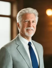 Dr. Adam L. Wilkes