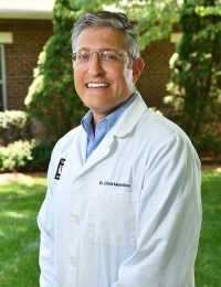 Dr. Chris Meletiou Dr. Chris Meletiou