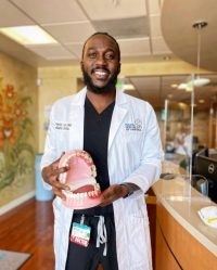 Dr Patrick Lolo